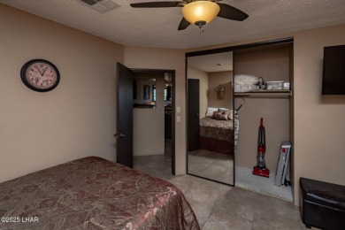 Desirable View Condo at Queensbay! This stunning lake-view condo on London Bridge Golf Course in Arizona - for sale on GolfHomes.com, golf home, golf lot