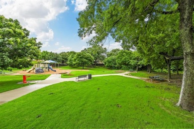 Discover luxury living in this stunning 5 bed, 4 bath home on The Shores Country Club in Texas - for sale on GolfHomes.com, golf home, golf lot