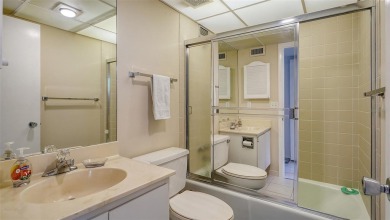 This two-bedroom, two bathroom unit in Privateer South has 1,409 on Links on Longboat Golf Club in Florida - for sale on GolfHomes.com, golf home, golf lot