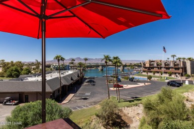 Desirable View Condo at Queensbay! This stunning lake-view condo on London Bridge Golf Course in Arizona - for sale on GolfHomes.com, golf home, golf lot