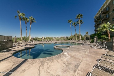 Desirable View Condo at Queensbay! This stunning lake-view condo on London Bridge Golf Course in Arizona - for sale on GolfHomes.com, golf home, golf lot