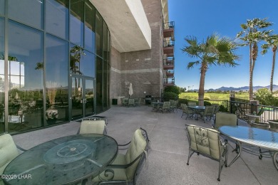 Desirable View Condo at Queensbay! This stunning lake-view condo on London Bridge Golf Course in Arizona - for sale on GolfHomes.com, golf home, golf lot