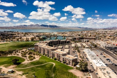 Desirable View Condo at Queensbay! This stunning lake-view condo on London Bridge Golf Course in Arizona - for sale on GolfHomes.com, golf home, golf lot