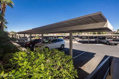 Desirable View Condo at Queensbay! This stunning lake-view condo on London Bridge Golf Course in Arizona - for sale on GolfHomes.com, golf home, golf lot