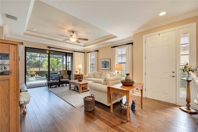 Discover the perfect balance of comfort and community in this on Esplanade Golf and Country at Lakewood Ranch in Florida - for sale on GolfHomes.com, golf home, golf lot