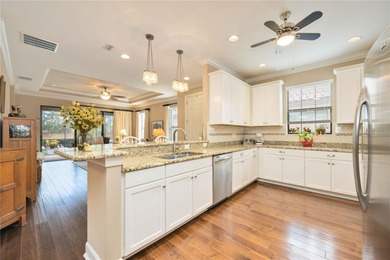 Discover the perfect balance of comfort and community in this on Esplanade Golf and Country at Lakewood Ranch in Florida - for sale on GolfHomes.com, golf home, golf lot