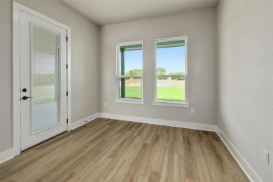 The Longhorn floorplan is spacious and open with patio and porch on Delaware Springs Golf Course in Texas - for sale on GolfHomes.com, golf home, golf lot