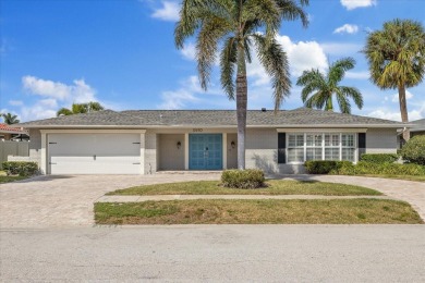 WATERFRONT POOL HOME in the coveted DANA SHORES community of on Rocky Point Golf Course in Florida - for sale on GolfHomes.com, golf home, golf lot