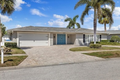 WATERFRONT POOL HOME in the coveted DANA SHORES community of on Rocky Point Golf Course in Florida - for sale on GolfHomes.com, golf home, golf lot
