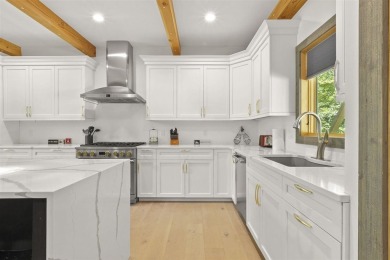 Welcome to Chalet des Beagle--an exceptional ski-in/ski-out on Boyne Mountain Resort - Monument Course in Michigan - for sale on GolfHomes.com, golf home, golf lot
