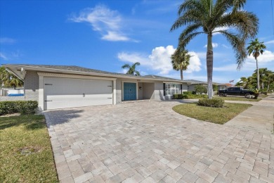 WATERFRONT POOL HOME in the coveted DANA SHORES community of on Rocky Point Golf Course in Florida - for sale on GolfHomes.com, golf home, golf lot
