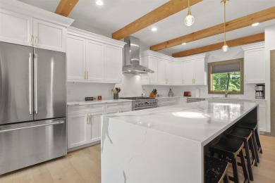 Welcome to Chalet des Beagle--an exceptional ski-in/ski-out on Boyne Mountain Resort - Monument Course in Michigan - for sale on GolfHomes.com, golf home, golf lot