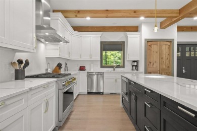 Welcome to Chalet des Beagle--an exceptional ski-in/ski-out on Boyne Mountain Resort - Monument Course in Michigan - for sale on GolfHomes.com, golf home, golf lot