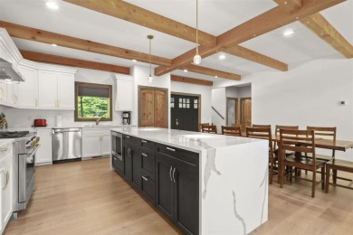 Welcome to Chalet des Beagle--an exceptional ski-in/ski-out on Boyne Mountain Resort - Monument Course in Michigan - for sale on GolfHomes.com, golf home, golf lot