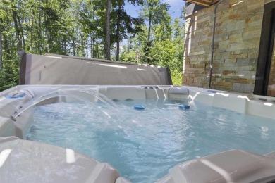 Welcome to Chalet des Beagle--an exceptional ski-in/ski-out on Boyne Mountain Resort - Monument Course in Michigan - for sale on GolfHomes.com, golf home, golf lot
