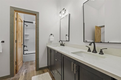 Welcome to Chalet des Beagle--an exceptional ski-in/ski-out on Boyne Mountain Resort - Monument Course in Michigan - for sale on GolfHomes.com, golf home, golf lot