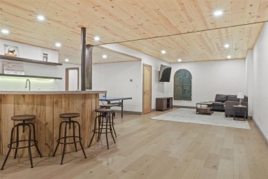 Welcome to Chalet des Beagle--an exceptional ski-in/ski-out on Boyne Mountain Resort - Monument Course in Michigan - for sale on GolfHomes.com, golf home, golf lot