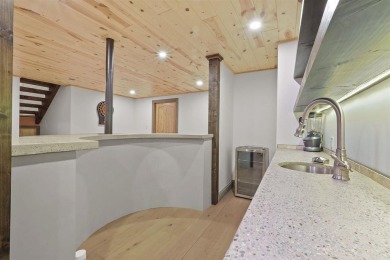 Welcome to Chalet des Beagle--an exceptional ski-in/ski-out on Boyne Mountain Resort - Monument Course in Michigan - for sale on GolfHomes.com, golf home, golf lot