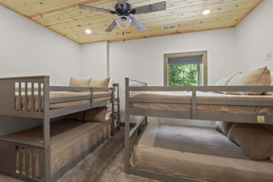 Welcome to Chalet des Beagle--an exceptional ski-in/ski-out on Boyne Mountain Resort - Monument Course in Michigan - for sale on GolfHomes.com, golf home, golf lot