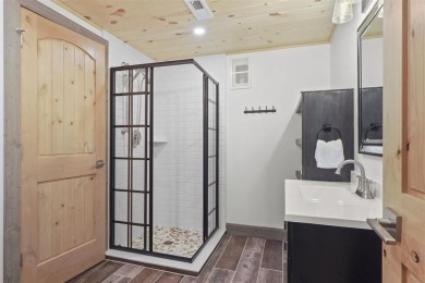 Welcome to Chalet des Beagle--an exceptional ski-in/ski-out on Boyne Mountain Resort - Monument Course in Michigan - for sale on GolfHomes.com, golf home, golf lot