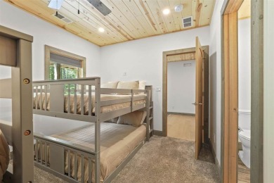 Welcome to Chalet des Beagle--an exceptional ski-in/ski-out on Boyne Mountain Resort - Monument Course in Michigan - for sale on GolfHomes.com, golf home, golf lot
