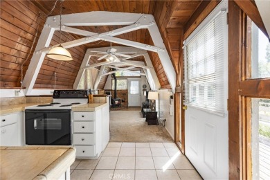 Tucked into a sunny, quiet corner of Pine Mountain Club, this on Pine Mountain Club in California - for sale on GolfHomes.com, golf home, golf lot