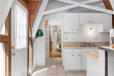 Tucked into a sunny, quiet corner of Pine Mountain Club, this on Pine Mountain Club in California - for sale on GolfHomes.com, golf home, golf lot