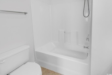 Discover the perfect blend of comfort and convenience in this on International Club of Myrtle Beach in South Carolina - for sale on GolfHomes.com, golf home, golf lot
