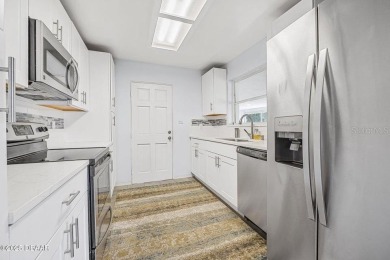 SELLER WILL CONSIDER OWNER FINANCING. Charming 3 bedroom, 3 bath on Oceanside Country Club in Florida - for sale on GolfHomes.com, golf home, golf lot