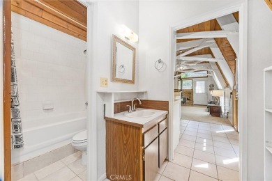 Tucked into a sunny, quiet corner of Pine Mountain Club, this on Pine Mountain Club in California - for sale on GolfHomes.com, golf home, golf lot