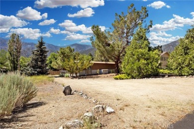 Tucked into a sunny, quiet corner of Pine Mountain Club, this on Pine Mountain Club in California - for sale on GolfHomes.com, golf home, golf lot