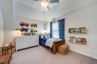 This STUNNING home is located in The Tribute- a premier golf on The Tribute At the Colony in Texas - for sale on GolfHomes.com, golf home, golf lot