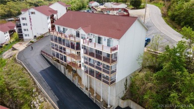 One of the BEST BUYS in high demand Clearwater Condominiums on The Club At Old Kinderhook in Missouri - for sale on GolfHomes.com, golf home, golf lot
