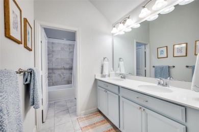This STUNNING home is located in The Tribute- a premier golf on The Tribute At the Colony in Texas - for sale on GolfHomes.com, golf home, golf lot