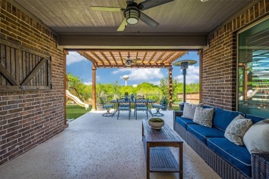 This STUNNING home is located in The Tribute- a premier golf on The Tribute At the Colony in Texas - for sale on GolfHomes.com, golf home, golf lot