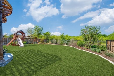 This STUNNING home is located in The Tribute- a premier golf on The Tribute At the Colony in Texas - for sale on GolfHomes.com, golf home, golf lot