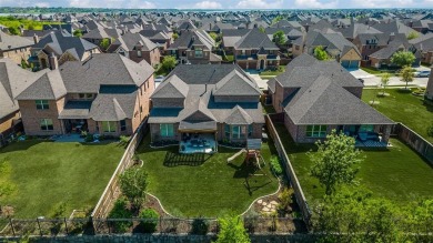 This STUNNING home is located in The Tribute- a premier golf on The Tribute At the Colony in Texas - for sale on GolfHomes.com, golf home, golf lot