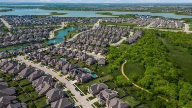 This STUNNING home is located in The Tribute- a premier golf on The Tribute At the Colony in Texas - for sale on GolfHomes.com, golf home, golf lot