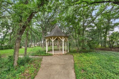 Lovely custom-built, one-owner home on a corner lot of a on Texas Rangers Golf Club  in Texas - for sale on GolfHomes.com, golf home, golf lot