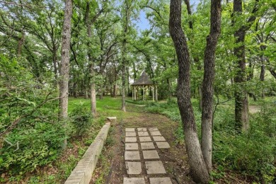 Lovely custom-built, one-owner home on a corner lot of a on Texas Rangers Golf Club  in Texas - for sale on GolfHomes.com, golf home, golf lot