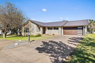 Enjoy resort living in this beautifully renovated home located on Slick Rock Golf Course - Horseshoe Bay in Texas - for sale on GolfHomes.com, golf home, golf lot