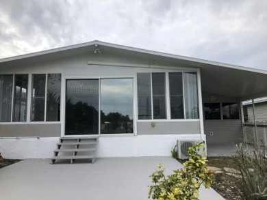 This open floor plan offers a specious kitchen with lots of on Fairways Country Club in Florida - for sale on GolfHomes.com, golf home, golf lot