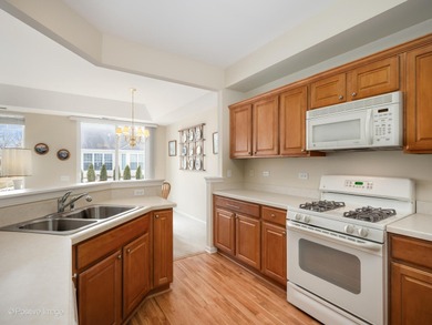 Welcome to this immaculately maintained 2-bedroom, 2-bath on Whisper Creek Golf Club in Illinois - for sale on GolfHomes.com, golf home, golf lot