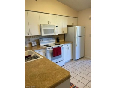 INVESTOR alert!   2 bed/ 2 bath END unit 2nd floor condo, with on Quail Run Golf Club In Naples in Florida - for sale on GolfHomes.com, golf home, golf lot