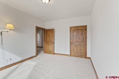 This single-family home in Montrose, Colorado offers easy living on The Bridges Golf and Country Club in Colorado - for sale on GolfHomes.com, golf home, golf lot