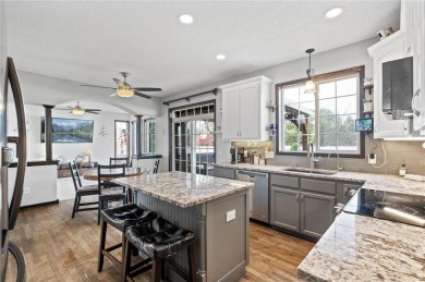 Welcome to 10416 62nd St NE, a thoughtfully designed 6-bedroom on Cedar Creek Golf Course in Minnesota - for sale on GolfHomes.com, golf home, golf lot