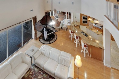 517 MiraBay Blvd | 4 Beds | 4 Baths | 4,089 Sq Ft | Waterfront on Apollo Beach Golf and Sea Club in Florida - for sale on GolfHomes.com, golf home, golf lot