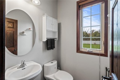 Welcome to 10416 62nd St NE, a thoughtfully designed 6-bedroom on Cedar Creek Golf Course in Minnesota - for sale on GolfHomes.com, golf home, golf lot