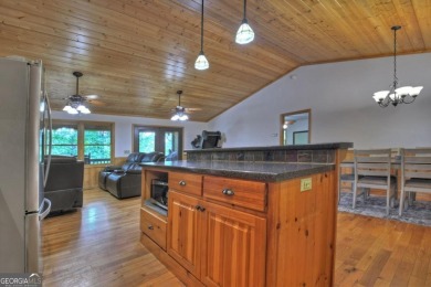 One-level living at its finest in the highly desirable Buckhorn on White Path Golf Club in Georgia - for sale on GolfHomes.com, golf home, golf lot