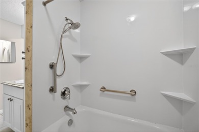 Live the carefree Florida lifestyle in this spacious 2-bedroom on Sandpiper Golf Club in Florida - for sale on GolfHomes.com, golf home, golf lot